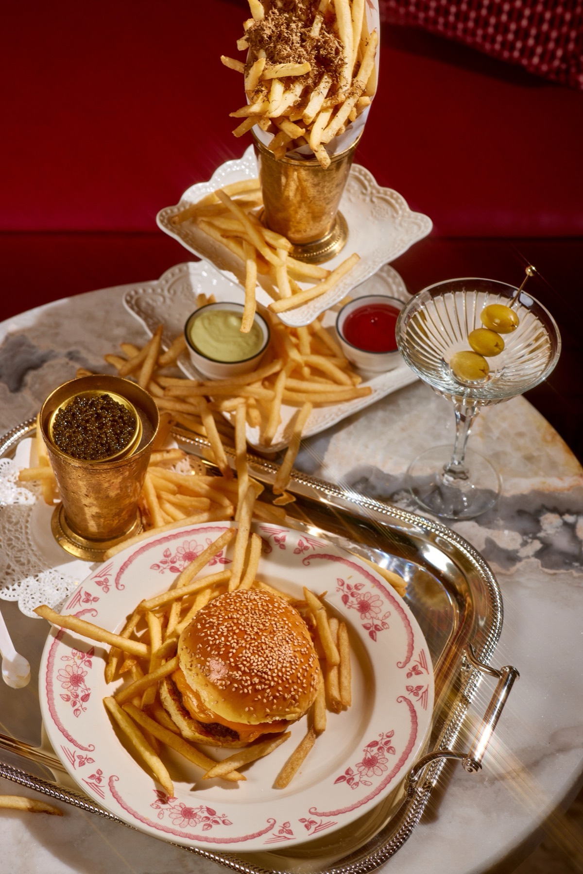 The Sirrah Burger, Endless Fries, caviar and a martini at the Meatpacking brunch