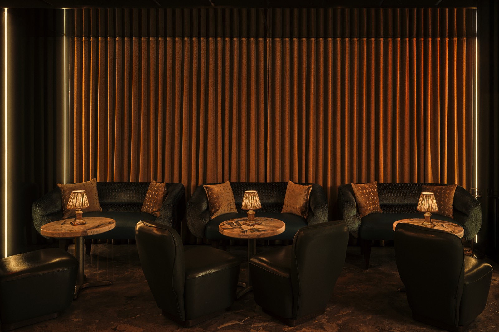 Private dining room at Sirrah steakhouse, set for a group dinner
