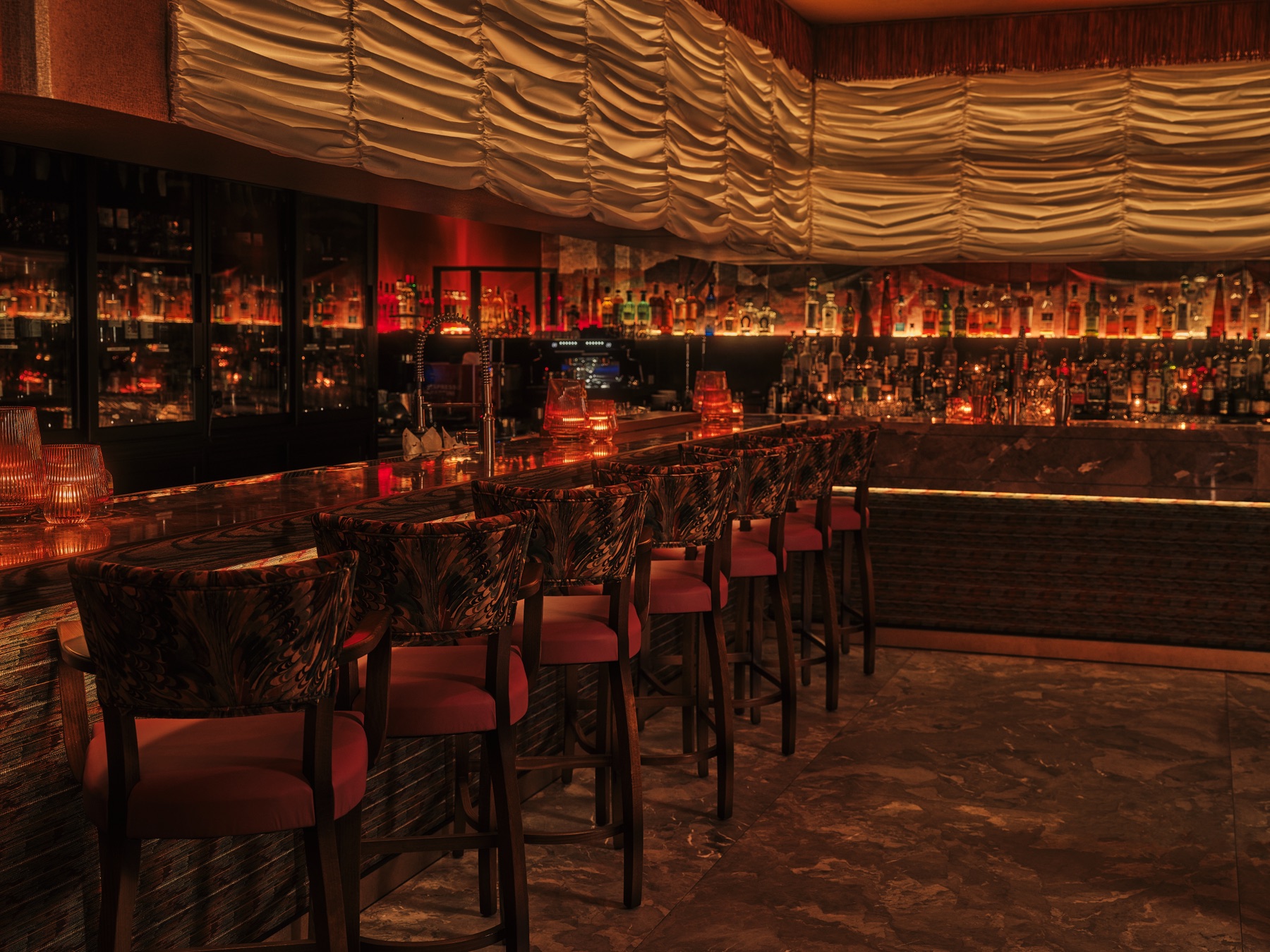 Cocktail bar and counter seats at Sirrah in the Meatpacking District